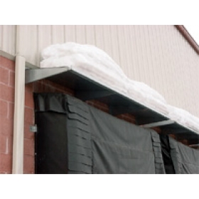 Dock door metal hoods keep out rain and snow.